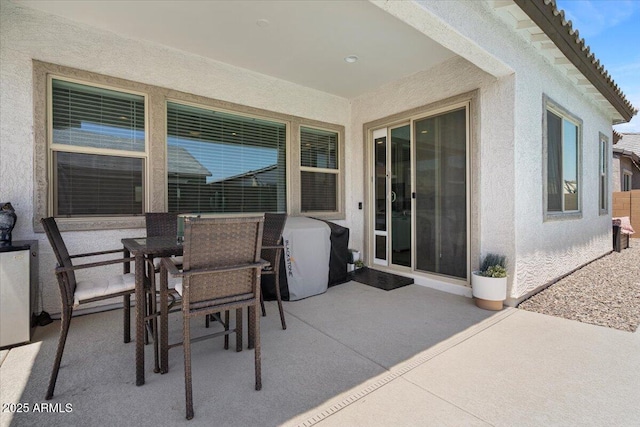 view of patio with outdoor dining area