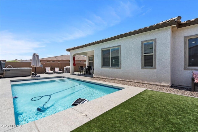 view of pool featuring a patio area, fence, and outdoor dining area