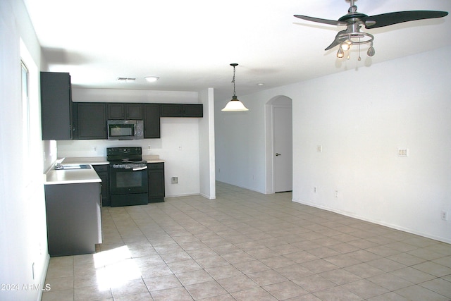 kitchen with black range with electric cooktop, light tile patterned floors, decorative light fixtures, sink, and ceiling fan