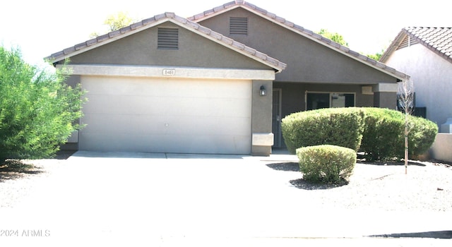 view of front of home with a garage