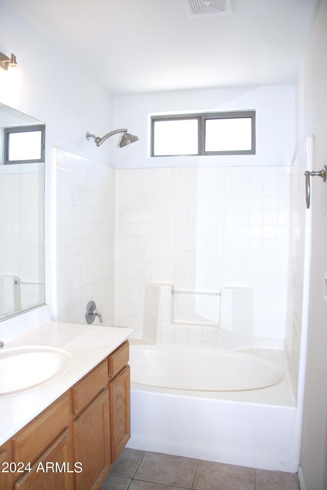 bathroom with vanity, tile patterned floors, and tub / shower combination