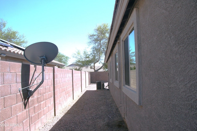 view of property exterior with central air condition unit