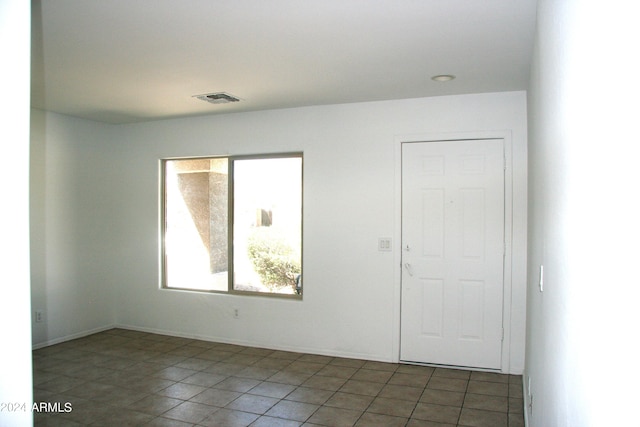 view of tiled empty room