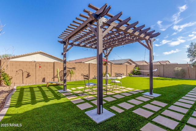 view of yard featuring a patio area, a fenced backyard, and a pergola