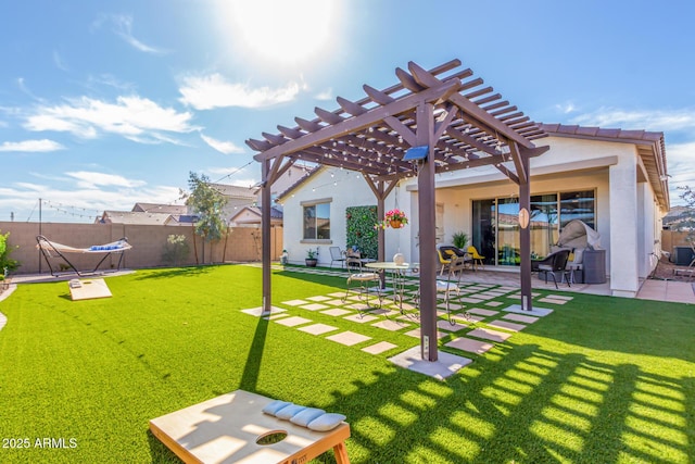 view of yard with a patio area, a pergola, and fence