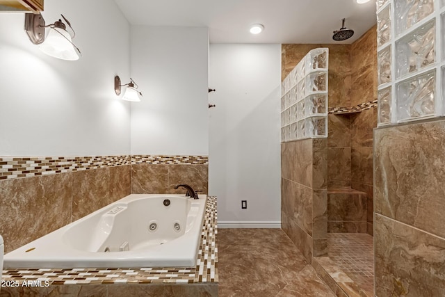 bathroom with shower with separate bathtub