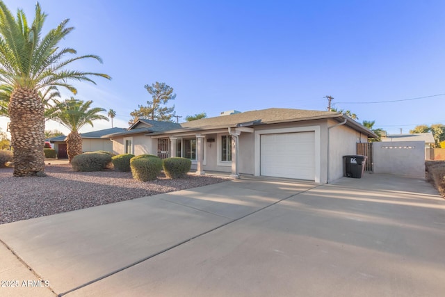 ranch-style house featuring a garage