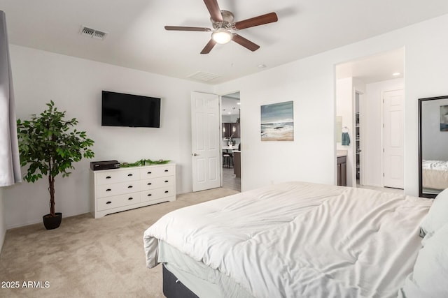3415 S 75th Dr, Phoenix, AZ 85043 - bedroom featuring light carpet, ceiling fan, and connected bathroom