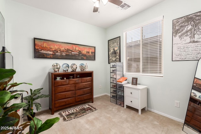 3415 S 75th Dr, Phoenix, AZ 85043 - living area with ceiling fan, light carpet, and baseboards