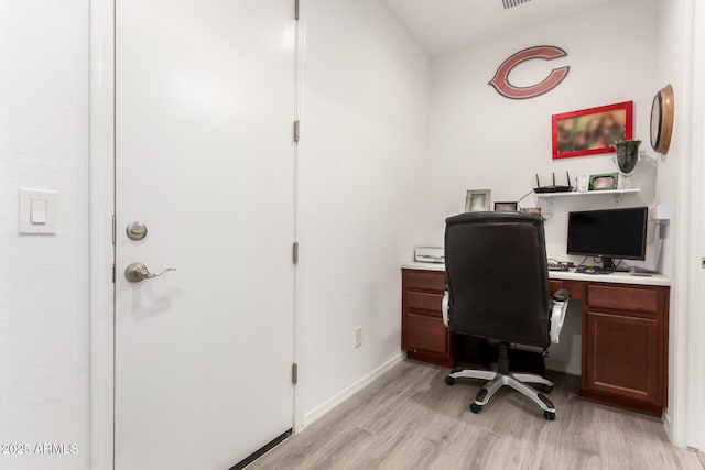 3415 S 75th Dr, Phoenix, AZ 85043 - office area featuring light wood-style flooring and baseboards