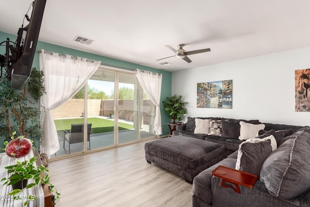 3415 S 75th Dr, Phoenix, AZ 85043 - living room featuring wood finished floors and a ceiling fan