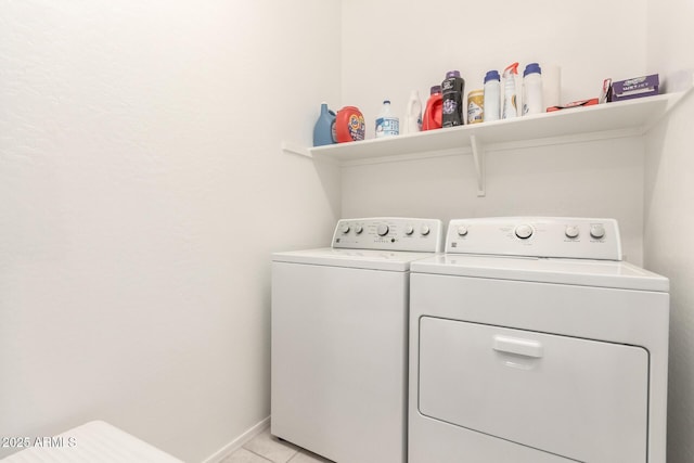 3415 S 75th Dr, Phoenix, AZ 85043 - washroom featuring separate washer and dryer, light tile patterned floors, and baseboards