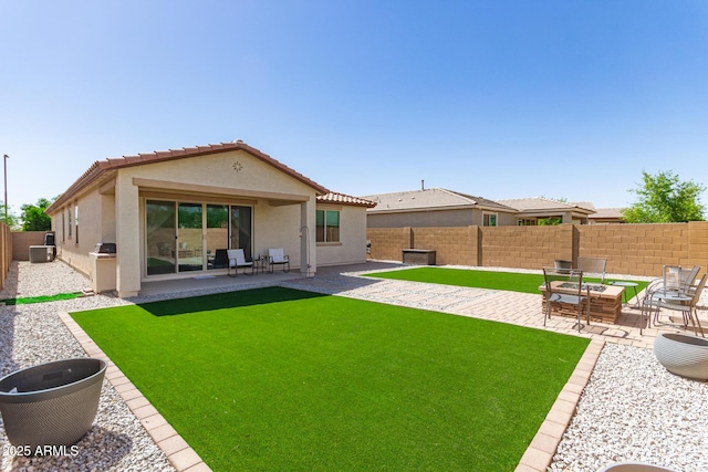 3415 S 75th Dr, Phoenix, AZ 85043 - back of property featuring stucco siding, a patio, and a tiled roof