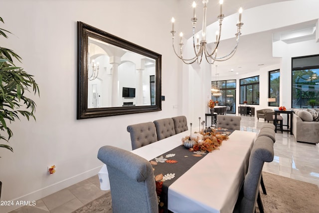 dining space with a chandelier