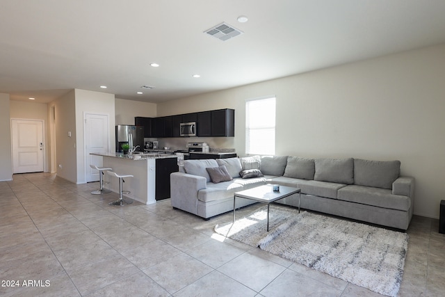 living room with light tile patterned floors