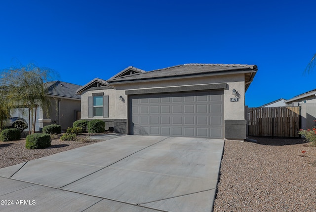 ranch-style home with a garage