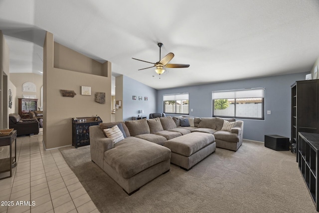 843 E Vera Ln, Tempe, AZ 85284 - living room with ceiling fan, vaulted ceiling, light tile patterned floors, and baseboards