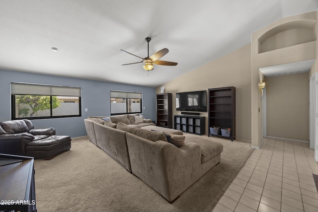 843 E Vera Ln, Tempe, AZ 85284 - living area featuring light colored carpet, a ceiling fan, plenty of natural light, vaulted ceiling, and light tile patterned floors