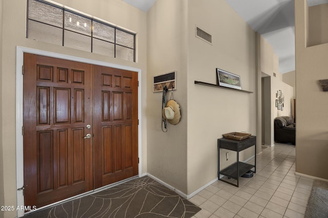 843 E Vera Ln, Tempe, AZ 85284 - tiled entryway with a towering ceiling and baseboards