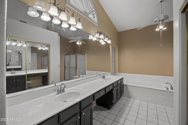 843 E Vera Ln, Tempe, AZ 85284 - full bath featuring a ceiling fan, tile patterned floors, a bath, double vanity, and a shower stall