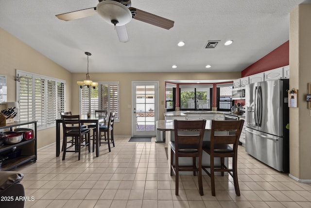 843 E Vera Ln, Tempe, AZ 85284 - dining area with lofted ceiling, ceiling fan, recessed lighting, a chandelier, and light tile patterned floors