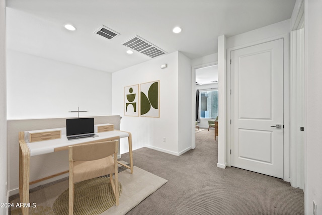 carpeted office space with recessed lighting, visible vents, and baseboards