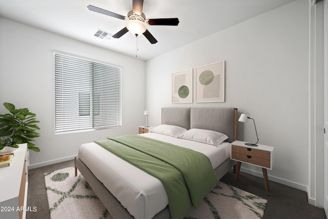carpeted bedroom with visible vents, a ceiling fan, and baseboards