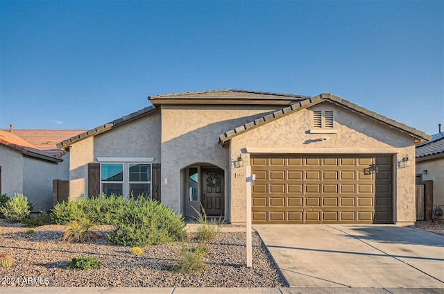 view of front of property featuring a garage