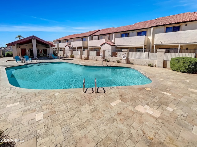 view of pool featuring a patio