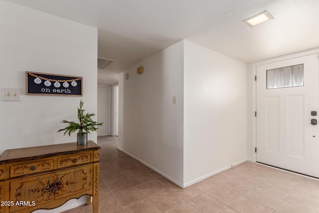 view of tiled foyer entrance