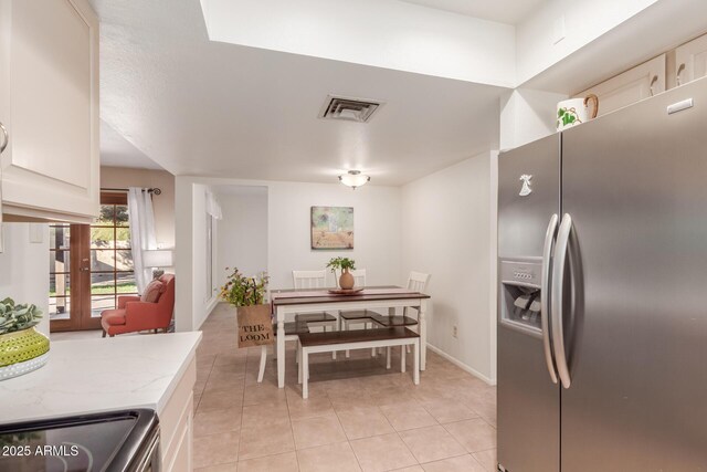 view of tiled dining area