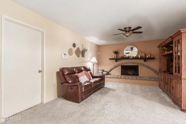 living room featuring ceiling fan and light carpet