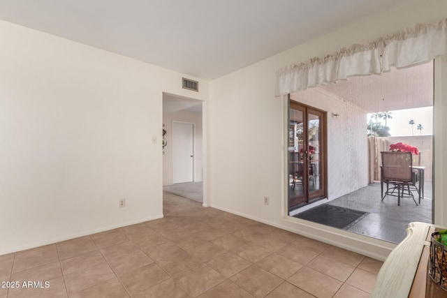 view of tiled spare room