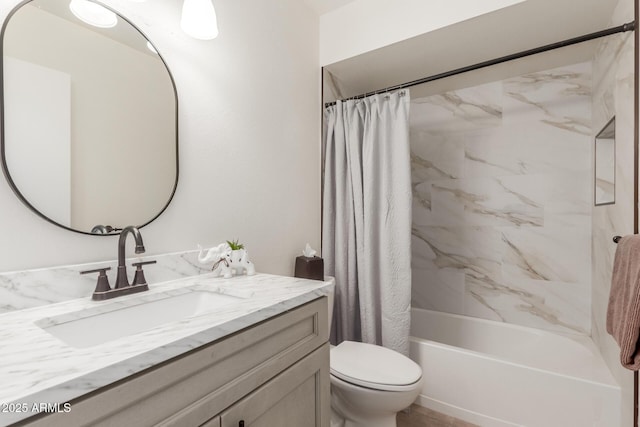 full bathroom featuring toilet, vanity, and shower / bath combo