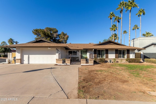 ranch-style home with a garage