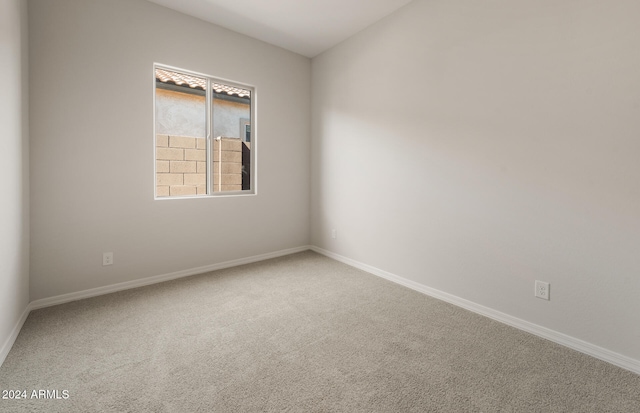 empty room featuring carpet floors