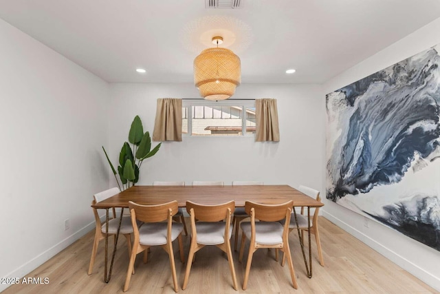 dining room with light wood-type flooring