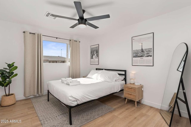 bedroom featuring ceiling fan and light wood-type flooring