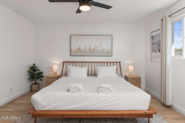 bedroom featuring ceiling fan and light wood-type flooring