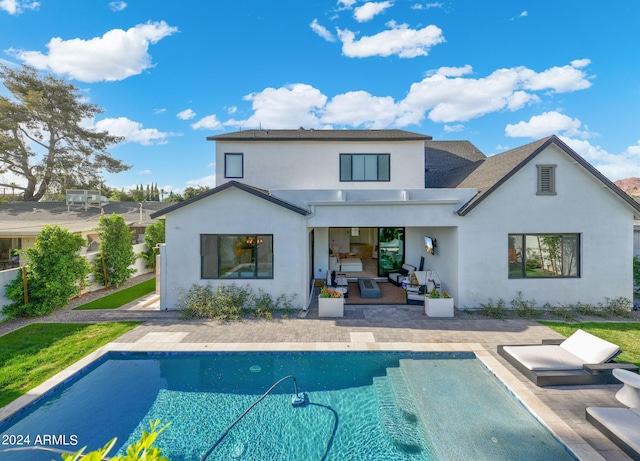 rear view of property with a patio