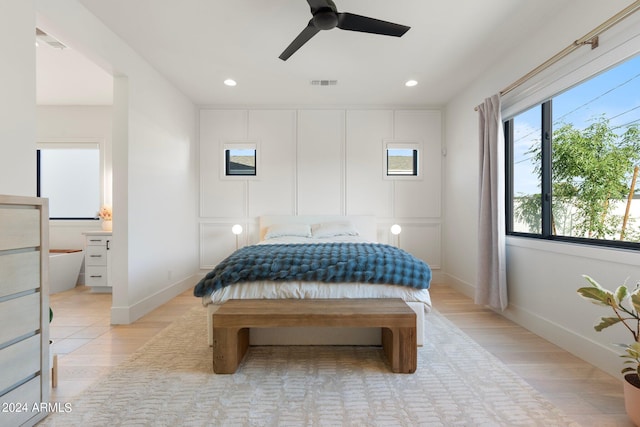 bedroom featuring light wood-type flooring and ceiling fan