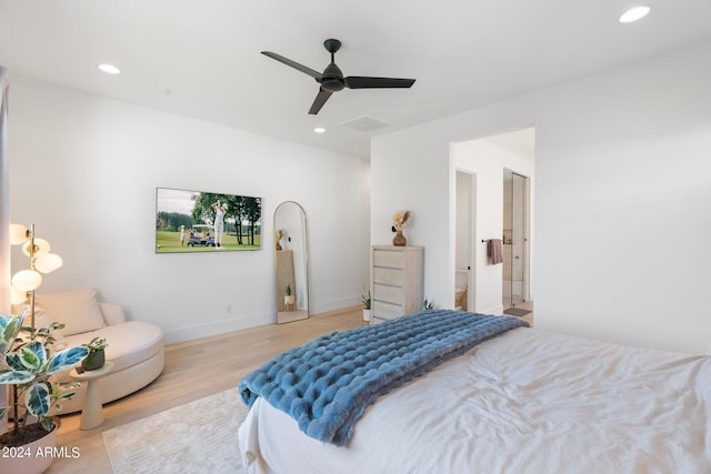 bedroom featuring ceiling fan and light hardwood / wood-style floors