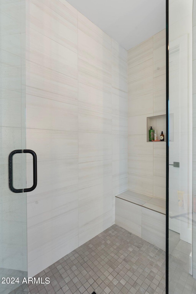 bathroom with an enclosed shower