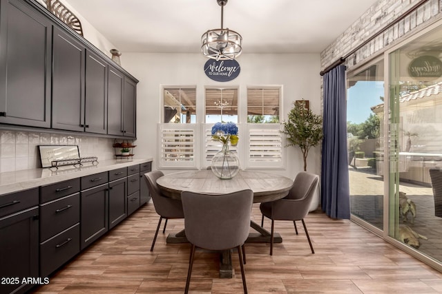 3990 E Iris Dr, Chandler, AZ 85286 - dining room featuring healthy amount of natural light and light wood-type flooring