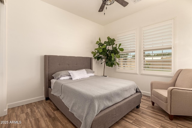 3990 E Iris Dr, Chandler, AZ 85286 - bedroom featuring wood finished floors, baseboards, and ceiling fan