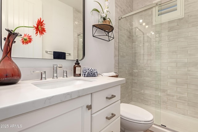 3990 E Iris Dr, Chandler, AZ 85286 - bathroom featuring vanity, a shower stall, and toilet