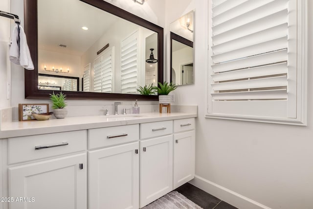 3990 E Iris Dr, Chandler, AZ 85286 - bathroom with vanity, baseboards, recessed lighting, and tile patterned flooring