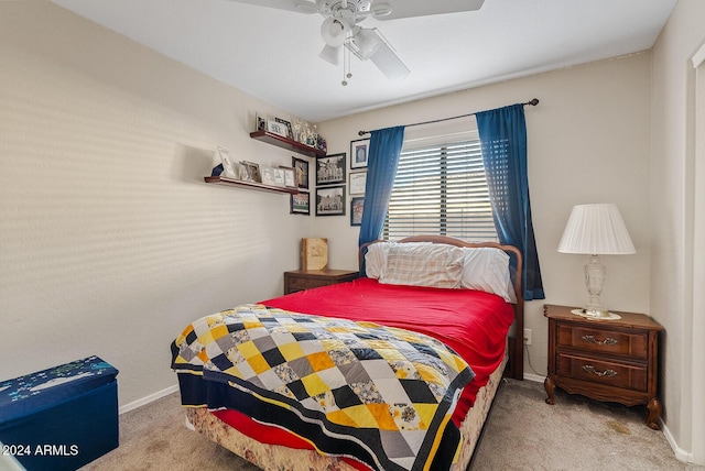 bedroom with light colored carpet and ceiling fan