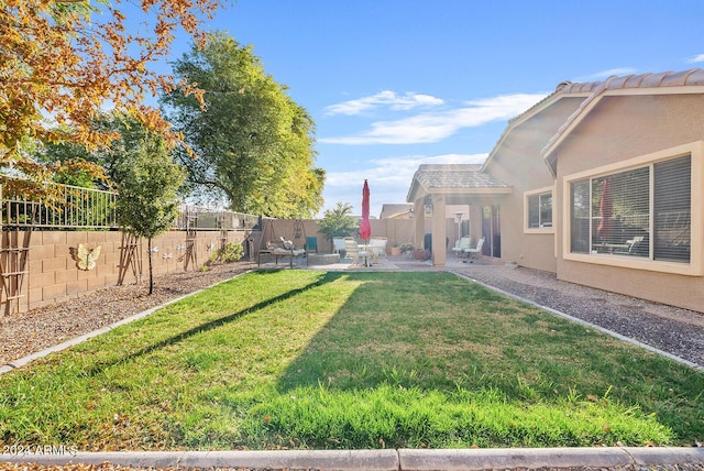 view of yard with a patio area