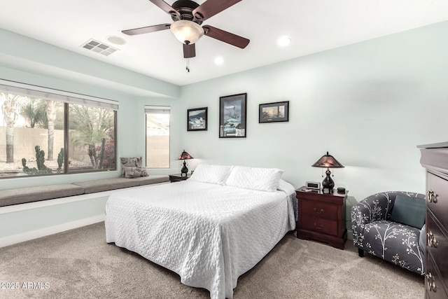 carpeted bedroom featuring visible vents, recessed lighting, a ceiling fan, and baseboards